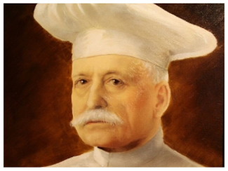 Auguste Escoffier On peut voir Auguste Escoiffer avec une toque a pizza et une moustache blanche