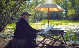 Projection du film documentaire "Rosa Bonheur" à l'espace des Augustins Vieille femme assis sur une table avec un parasol en train de peindre